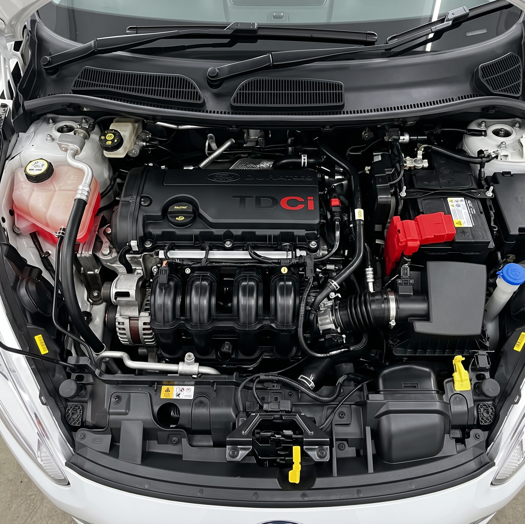 Motorruimte van een lesauto